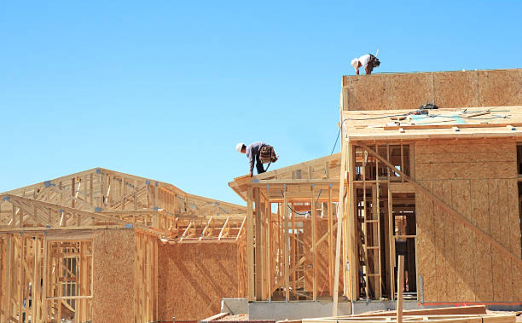 Attic insulation under a pitched roof with a wooden frame